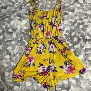 Eye candy yellow floral romper with pockets